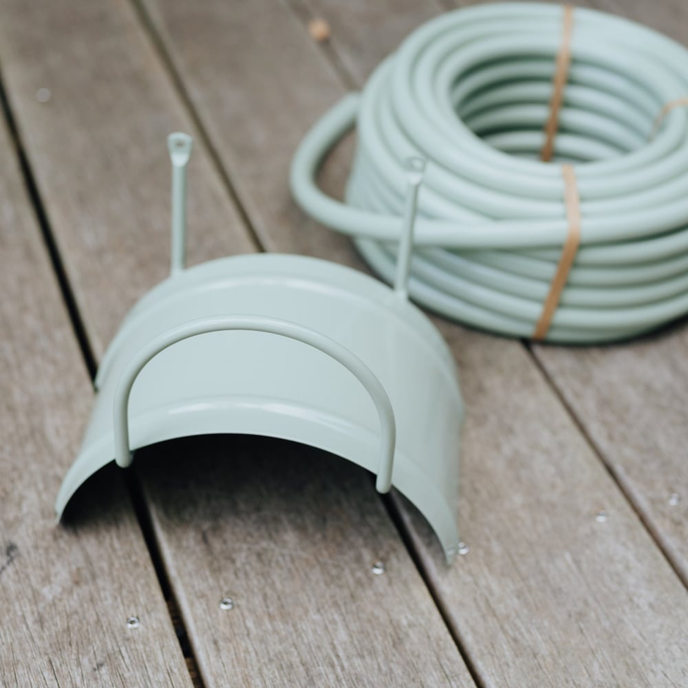 Wandhalterung und Schlauch